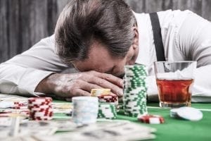 Man Gambling and in Debt