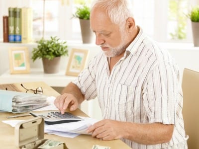 senior doing taxes image