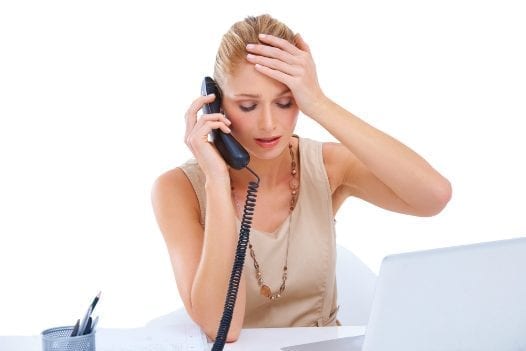 Stressed Woman with Paperwork