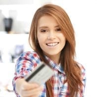 Young Americans Incur More Debt, Pay It Off More Slowly, Study Says Young woman with credit card