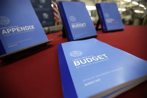 Sequestration has not slowed the economy. Obama prepares to submit budget to Congress.