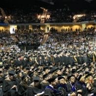 Graduate School Isn’t Worth the Money College graduates in diploma ceremony