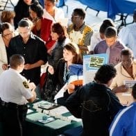 Get a Jumpstart on Landing a Job Before Graduating from College College students at job fair