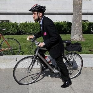 Man riding a bike to work