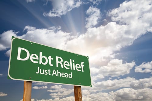 debt relief just ahead road sign