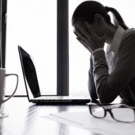 Katy Learns the Cost of Financial Ignorance woman in despair over finances