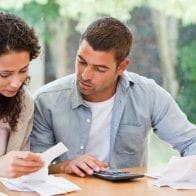 Best Places to Get a Debt Consolidation Loan in 2018 couple-with-bills-and-calculator