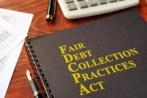 FDCPA Fair Debt Collection Practices Act book on a table