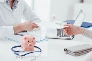 Two people sitting and discussing their medical student loan debt