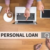 Personal Loans on the Rise People sitting at computers and tablets looking up personal loans to submit an application