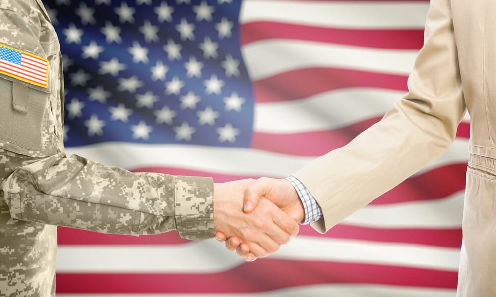 Veteran and business owner shaking hands