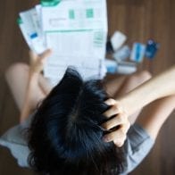 Debt Consolidation for Payday Loans Woman stressed about payday loans looks into consolidation