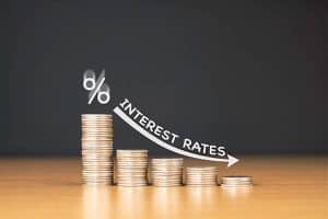 Low interest rate displayed on stack of coins