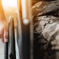 President Trump Signs Order to Erase Student Loan Debt for Disabled Veterans Disabled veteran in a wheelchair