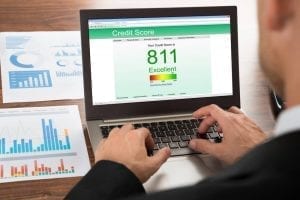 Desktop computer showing a credit score over 800