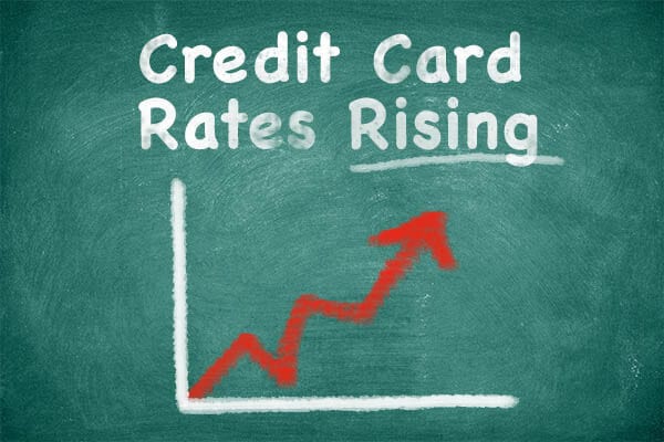 Chalkboard with graph of rising credit card rates