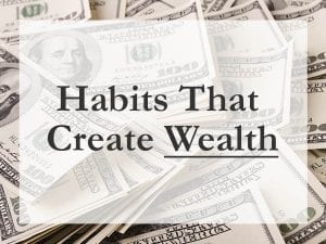 Sign that says habits that create wealth with money background
