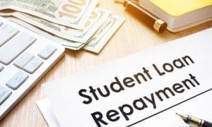 Student loan repayment form on desk