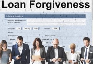 People standing in front of wall with Loan Forgiveness forum concept pasted on wall