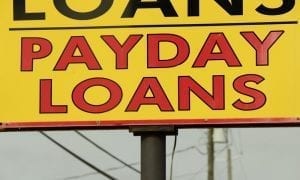 Roadside sign that says Payday Loans