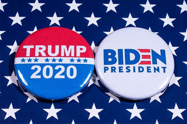 Campaign buttons for Trump and Biden