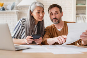 Couple weighing the pros and cons of filing bankruptcy