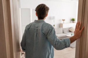 Man walking into living room