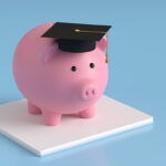 Piggy bank with graduation cap