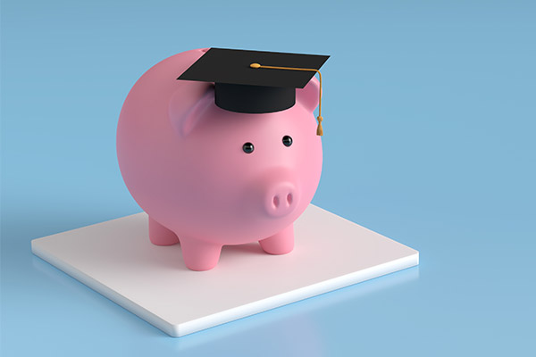 Piggy bank with graduation cap