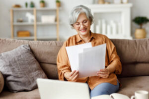 Senior citizen reading loan offer