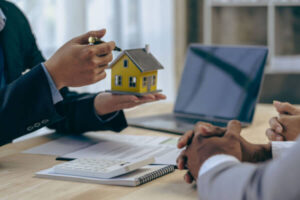 Attorney discussing home ownership with a client