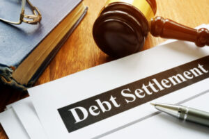 Debt settlement paperwork on desk