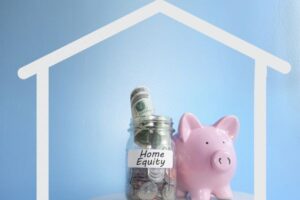 Piggy bank coin jar with Home Equity written.